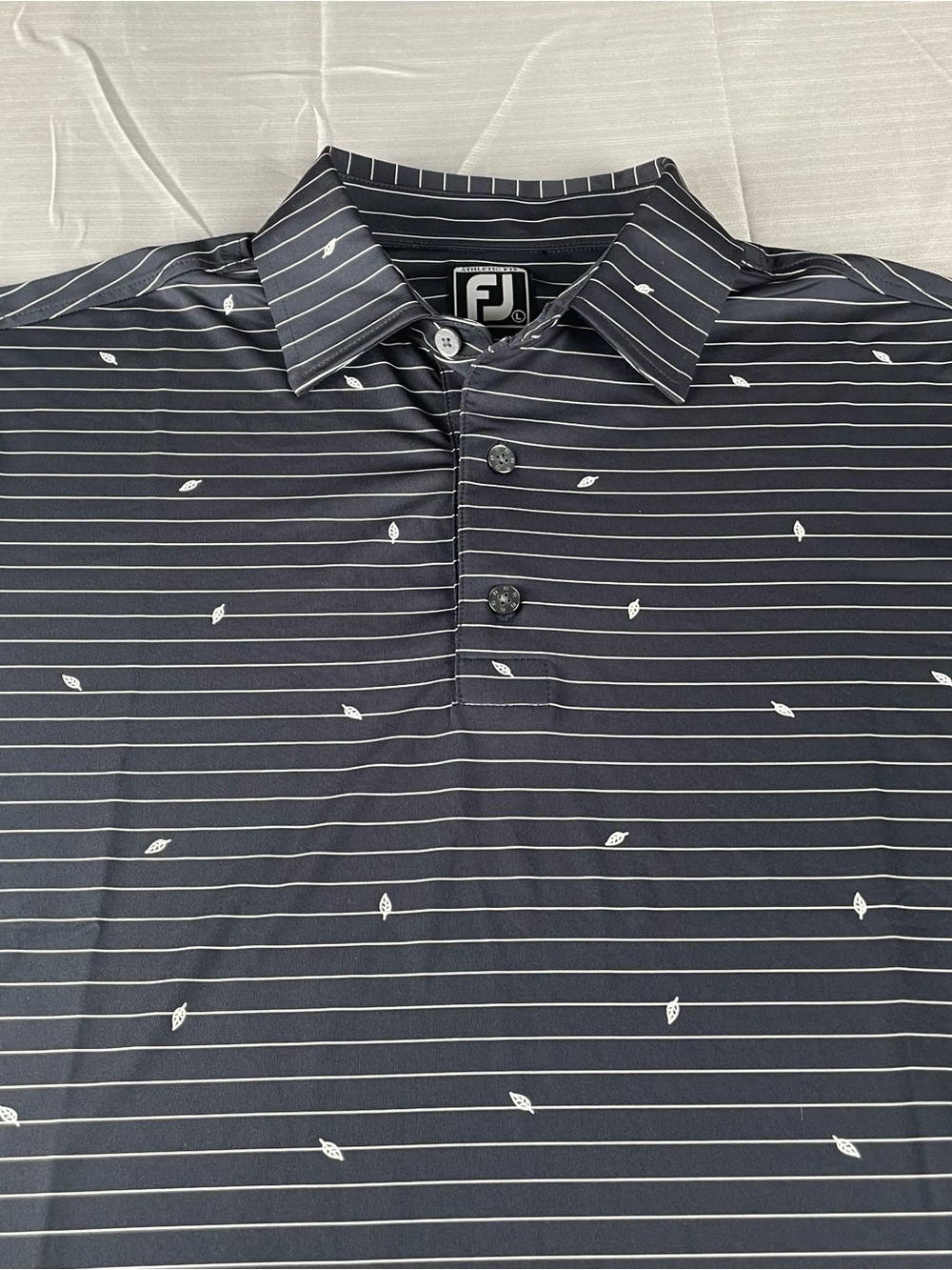 FootJoy Athletic Fit Golf Polo with White Pinstripes and Leaf Motif